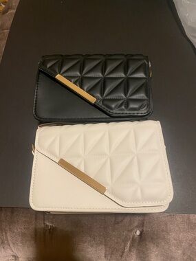 Set of two purses one black and one white